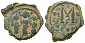 HERACLIUS. HERACLIUS CONSTANTINE and MARTINA.610-641 AD.Constantinople Mint.AE Follis

Obverse : Heraclius, in center, flanked by Martina, on left, an...