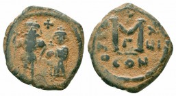 CONSTANS II. 641-668 AD.Constantinople Mint.AE Follis

Obverse : Constans II standing facing, holding long cross. M
Reverse : Constantine IV, Heracliu...
