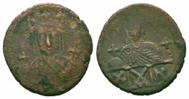 CONSTANTINE VI and IRENE.780-797 AD.Constantinople Mint.AE Follis

Obverse : Crowned bust of Irene, wearing loros, holding cross on globe and cross-he...