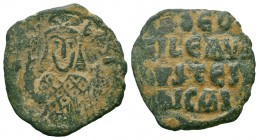 THEOPHILUS.829-842 AD.Constantinople Mint.AE Bronze

Obverse : ΘЄOFIL ЬASIL; facing bust, holding labarum and globus cruciger, and wearing crown surmo...