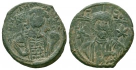 MICHAEL VII DUCAS.1071-1078 AD.Constantinople Mint.AE Follis

Obverse : IC - XC; Facing bust of Christ Pantokrator; star to left and right
Reverse : M...