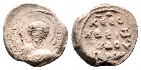 Byzantine lead seal of Apros officer 11th cent

Obverse : Bust of saint martyr Theodoros, facial, nimbate, in military garments, holding a spear in hi...