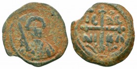 CRUSADERS.Antioch.Tancred.1101-1112 AD.AE Follis

Obverse : KE BOIΘH TANKRI; bust of Tancred facing, wearing turban and chain mail, holding sword over...