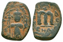 UMAYYAD CALIPHATE.Pseudo Byzantine Type.Imitating the types of Constans II.Circa 647-670 AD.AE Fals

Obverse : Emperor standing facing, holding long c...