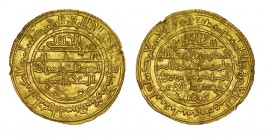 DINAR ALMORÁVIDE. Texufin y el Amir ibrahim. Sevilla. 539 H. IA con siete líneas. VA-1869. 4,10 g. RARA. MBC+