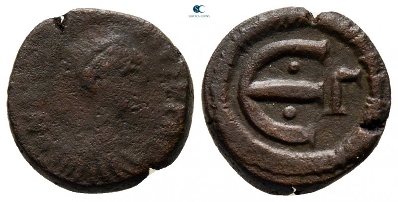 Anastasius I AD 491-518. Constantinople
Pentanummium Æ

13 mm., 2,16 g.


...