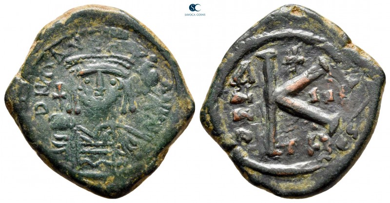 Maurice Tiberius AD 582-602. Thessalonica
Half Follis or 20 Nummi Æ

25 mm., ...