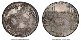 Zurich. Canton "City View" Taler 1761 MS62 PCGS, KM143.4, Dav-1791. Decorated in a steel-hued patina, with underlying luster that sparkles through the...