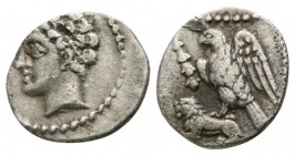 Obol AR
Cilicia, uncertain mint, c. 400 BC. Male head left, wearing grain wreath, within dotted border / Eagle standing left, spreading wings, on bac...