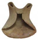 A Hellenistic lamp, 4th century BC, 3,7 x 8,8 cm
