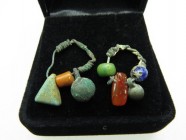 Sassanid bronze ornate earrings (bronze, glass and amber), 3rd-7th century AD, ø c. 20 mm