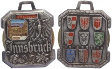 Blechmedaille, o. Jahr
von Innsbruck, hohl mit Scheibe zum drehen mit verschiedenen Stadtansichten, Dm 46x37 mm, mot Öse.. Hall
14,64g
vz