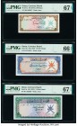 Oman Oman Currency Board 100 Baiza; 1/4 Rial Omani; 1/2 Rial Omani ND (1973) Pick 7a; 8a; 9a Three Examples PMG Superb Gem Unc 67 EPQ (2); Gem Uncircu...