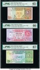 Qatar Qatar Monetary Agency 1; 5; 10 Riyals ND (ca. 1980) Pick 7; 8b; 9 Three Examples PMG Gem Uncirculated 65 EPQ; Gem Uncirculated 66 EPQ; Superb Ge...