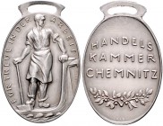 Medaillen von Karl Goetz Silbermedaille o.J. Handelskammer Chemnitz FÜR TREUE IN DER ARBEIT Kien. 363a. Slg. Bö. 5957. 
24x32mm 13,7g mit Bandöse vz-...