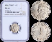 CYPRUS: 1/2 Piastre (1934) in copper-nickel with crowned bust of King George V facing left. Denomination and date on reverse. Inside slab by NGC "MS 6...