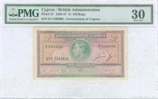 GREECE: 2 Shillings (25.8.1947) in green and violet with portrait of King George VI at center. S/N: "D/1 048986". Inside holder by PMG "Very Fine 30"....