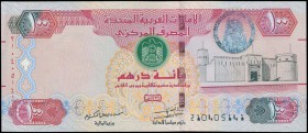 UNITED ARAB EMIRATES: 100 Dirhams (2014 / AH1435) in red, red-violet and black on multicolor unpt with Fahidi Fort in Dubai at right. S/N: "210405141"...