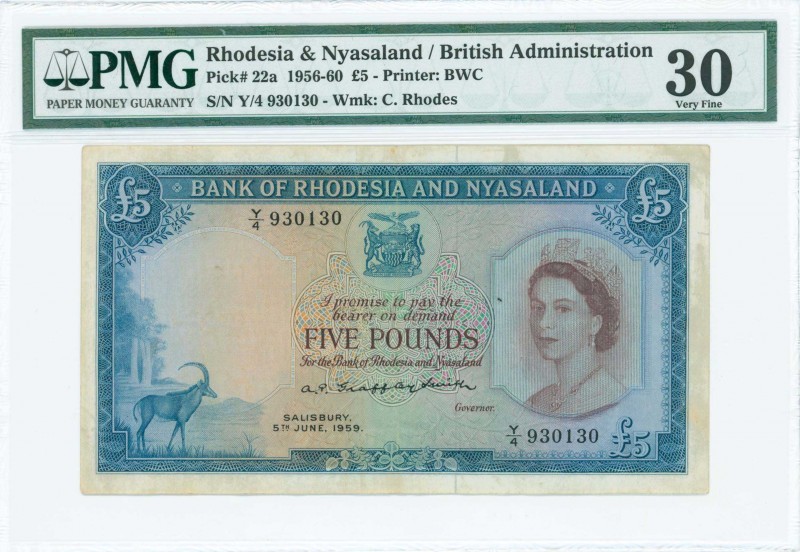 RHODESIA & NYASALAND: 5 Pounds (5.6.1959) in blue on multicolor unpt with portra...