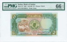 SUDAN: 5 Pounds (Law 1985 / AH1405) in olive and brown on multicolor unpt with cattle at left and outline map of Sudan at center. S/N: "D/39 039815". ...