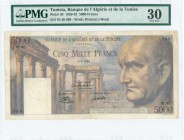 TUNISIA: 5000 Francs (3.3.1950) in violet with roman ruins at left and roman emperor Vespasian at right. S/N: "W.40 968". WMK: Womans Head. Inside hol...