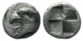 Aeolis, Kyme, c. 450-400 BC. AR Hemiobol (6mm, 0.50g). Head of eagle l.; K to l. R/ Quadripartite incuse square. Klein 333; SNG Copenhagen 31. VF