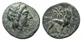Ionia, Miletos, c. 350-325 BC. Æ (11mm, 1.03g, 12h). Dionysos, magistrate. Laureate head of Apollo r. R/ Lion standing r., head l.; star above. Cf. SN...