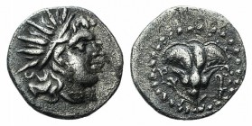 Islands off Caria, Rhodes, c. 188-84. AR Diobol (11mm, 0.84g, 12h). Radiate head of Helios r. R/ Rose; all within bearded circle. SNG Keckman 699 var....