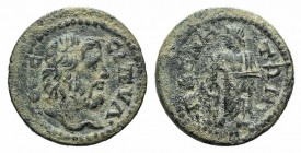 Lydia, Magnesia ad Sipylum, 3rd century AD. Æ (21mm, 4.61g, 6h). Bearded head of Mount Sipylos r. R/ Asklepios standing facing, head l., holding serpe...