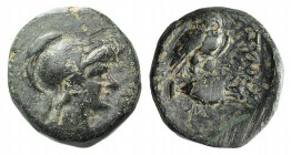 Phrygia, Synnada, c. 133-1st century BC. Æ (15mm, 4.11g, 1h). Helmeted head of Athena r. R/ Owl standing r., head facing, on overturned amphora. SNG C...