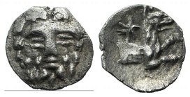 Lycaonia, Laranda, c. 324/3 BC. AR Obol (9mm, 0.44g, 3h). Facing head of Herakles. R/ Forepart of wolf r.; star above. Göktürk 68. VF