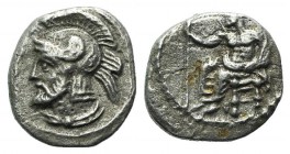 Cilicia, Tarsos. Pharnabazos (380-374/3 BC). AR Obol (8mm, 0.69g, 3h). Baaltars seated l., holding lotus-tipped sceptre. R/ Helmeted and bearded male ...