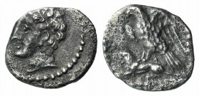 Cilicia, Uncertain, 4th century BC. AR Obol (10mm, 0.53g, 12h). Male head l., wearing wreath of grain ears. R/ Eagle standing l., spreading wings, on ...