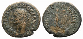 Domitian (81-96). Macedon, Philippi. Æ (26mm, 8.93g, 12h). Laureate head l. R/ Statues of Augustus and Divus Julius on base; two smaller bases flankin...