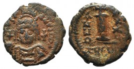 Justinian I (527-565). Æ 10 Nummi (19mm, 4.41g, 6h). Theoupolis (Antioch), year 30 (556/7). Crowned and cuirassed facing bust, holding globus cruciger...