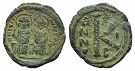 Justin II and Sophia (565-578). Æ 20 Nummi (24mm, 6.37g, 6h). Constantinople, year 1 (565/6). Justin and Sophia seated facing on double throne, holdin...