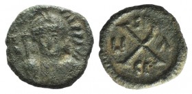 Maurice Tiberius (582-602). Æ 10 Nummi (14mm, 2.62g, 6h). Syracuse, 588-602. Helmeted, draped and cuirassed bust facing, holding long cross. R/ Large ...