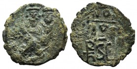 Heraclius (610-641). Æ 40 Nummi (27mm, 6.68g, 6h). Syracuse, 632-641. Countermarked on an overstruck of Heraclius, Constantinople: crowned facing bust...