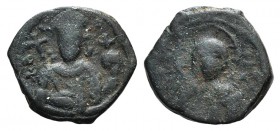 Alexius I (1081-1118). Æ Tetarteron (18mm, 2.89g, 6h). Thessalonica, 1092-1118. Facing bust of Christ Pantokrator. R/ Facing bust of Alexius I, holdin...