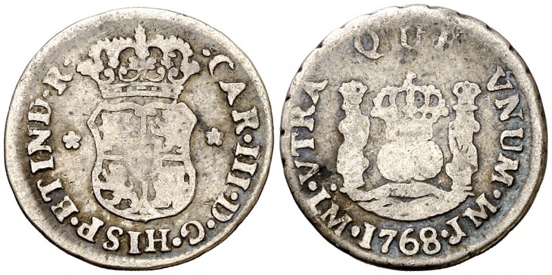 1768. Carlos III. Lima. JM. 1/2 real. (AC. 122). 1,65 g. Columnario. Punto sobre...