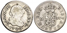 1780. Carlos III. Madrid. PJ. 1/2 real. (AC. 164). 1,49 g. Intento de perforación en anverso. (BC+/MBC-).