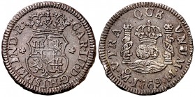 1769. Carlos III. México. M. 1/2 real. (AC. 188). 1,67 g. Columnario. Golpe en canto. Pátina oscura. (MBC+).