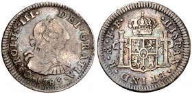 1783. Carlos III. México. FF. 1/2 real. (AC. 210). 1,62 g. Golpecitos. Pátina. BC+/MBC-.