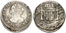 1785. Carlos III. Potosí. PR. 1/2 real. (AC. 262). 1,61 g. Hojitas en reverso. (BC+/MBC-).