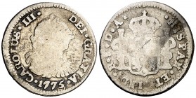 1775. Carlos III. Santiago. DA. 1/2 real. (AC. 278). 1,47 g. Acuñación descuidada. Rara, sólo hemos tenido tres ejemplares. MC.