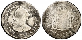 1781. Carlos III. Santiago. DA. 1/2 real. (AC. 290). 1,39 g. Rara, sólo hemos tenido cuatro ejemplares. RC.
