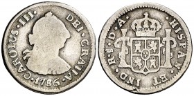 1786. Carlos III. Santiago. DA. 1/2 real. (AC. 299). 1,60 g. Escasa. BC-/BC.