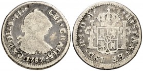 1787. Carlos III. Santiago. DA. 1/2 real. (AC. 301). 1,49 g. Rara, sólo hemos tenido dos ejemplares. BC-.