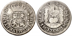1764. Carlos III. Lima. JM. 1 real. (AC. 347). 3,05 g. Columnario. Rayitas. Ex Colección Iriarte, Áureo 04/03/1998, nº 143. Escasa. (BC).