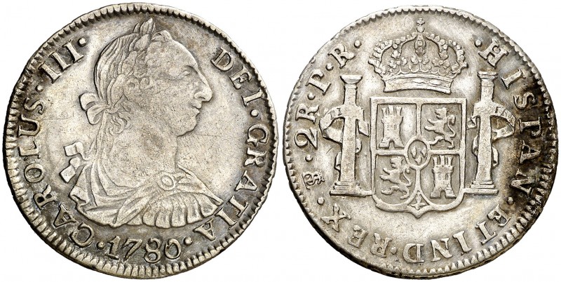 1780. Carlos III. Potosí. PR. 2 reales. (AC. 725). 6,60 g. Leve oxidación en rev...